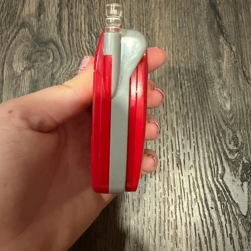 Source Unknown Red and Gray Flip Phone Toy with Red Ranger Graphic